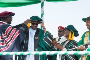 President Buhari being conferred Honorary Doctorate degree of Letters by the Visitor to the Kaduna State University and Governor of Kaduna Nasir El-Rufai, with him is Vice Chan-cellor of the University Prof. William Barnabas and Kaduna State Commissioner of Education Dr Shehu Usman Adamu during the 2nd Convocation of the Kaduna State University in Kaduna on 12th Dec 2015