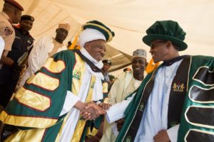 President Buhari with HRH Malam Tagwai Sambo, Chief of Moroa and Chancellor to the University after being conferred Honowith rary Doctorate degree of Letters during the 2nd Con-vocation of the Kaduna State University in Kaduna on 12th Dec 2015 