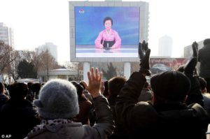 North Koreans celebrating the nuclear blast